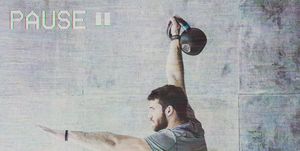 Man working out with kettlebell