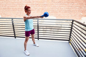 low impact exercises a person doing a kettlebell swing