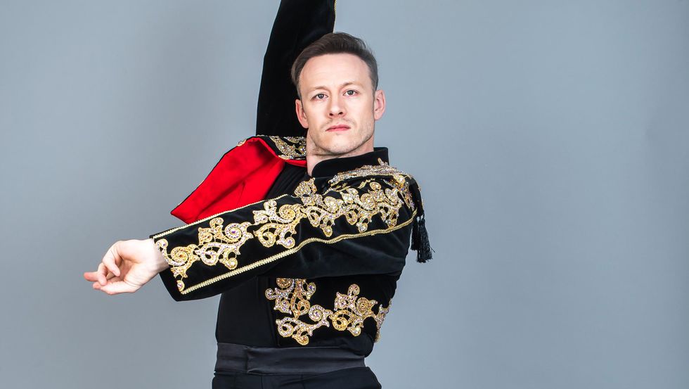 Kevin Clifton posing for a strictly ballroom UK tour