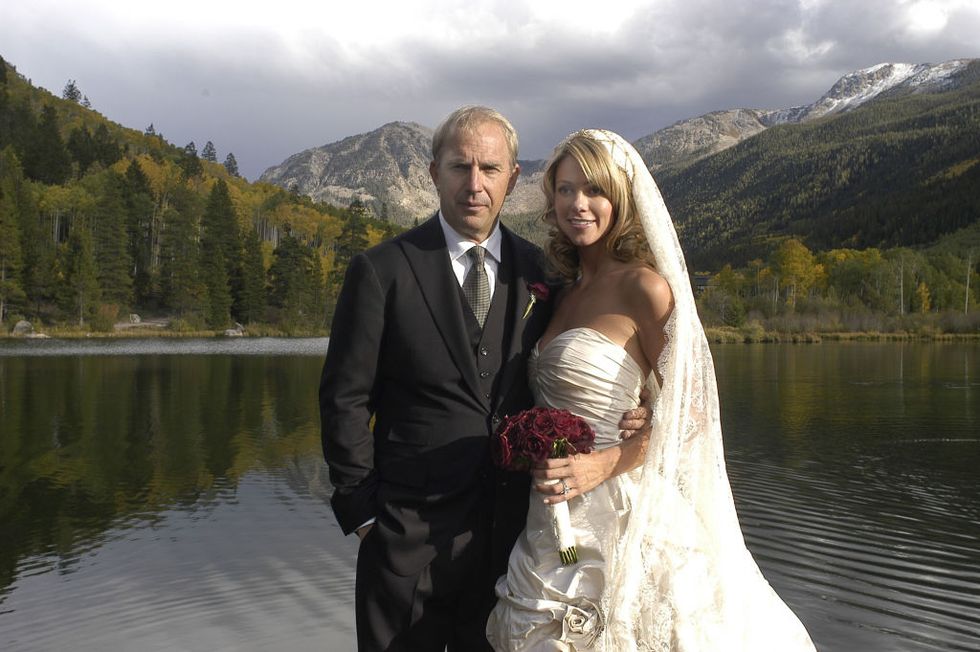 kevin costner married his girlfriend of 5 years, christine baumgartner at their aspen, colorado ranch on september 25, 2004 during the kevin costner and christine baumgartner wedding photos in aspen, co photo by wireimage housewireimage