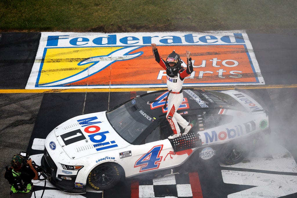 Kevin Harvick, driver of the Mobil 1 Chevrolet, stands on the grid