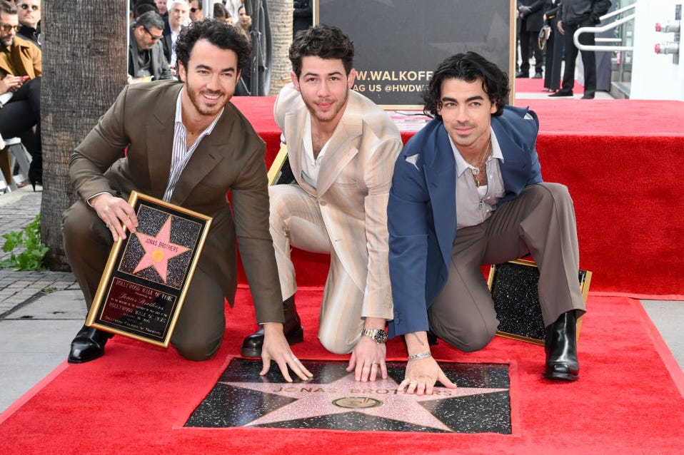 jonas brothers honored with star on the hollywood walk of fame