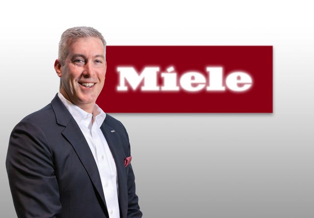 speaker kevin pchola's headshot, pictured in front of the miele logo