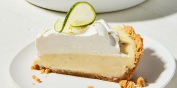 key lime pie with whipped cream and lime slice