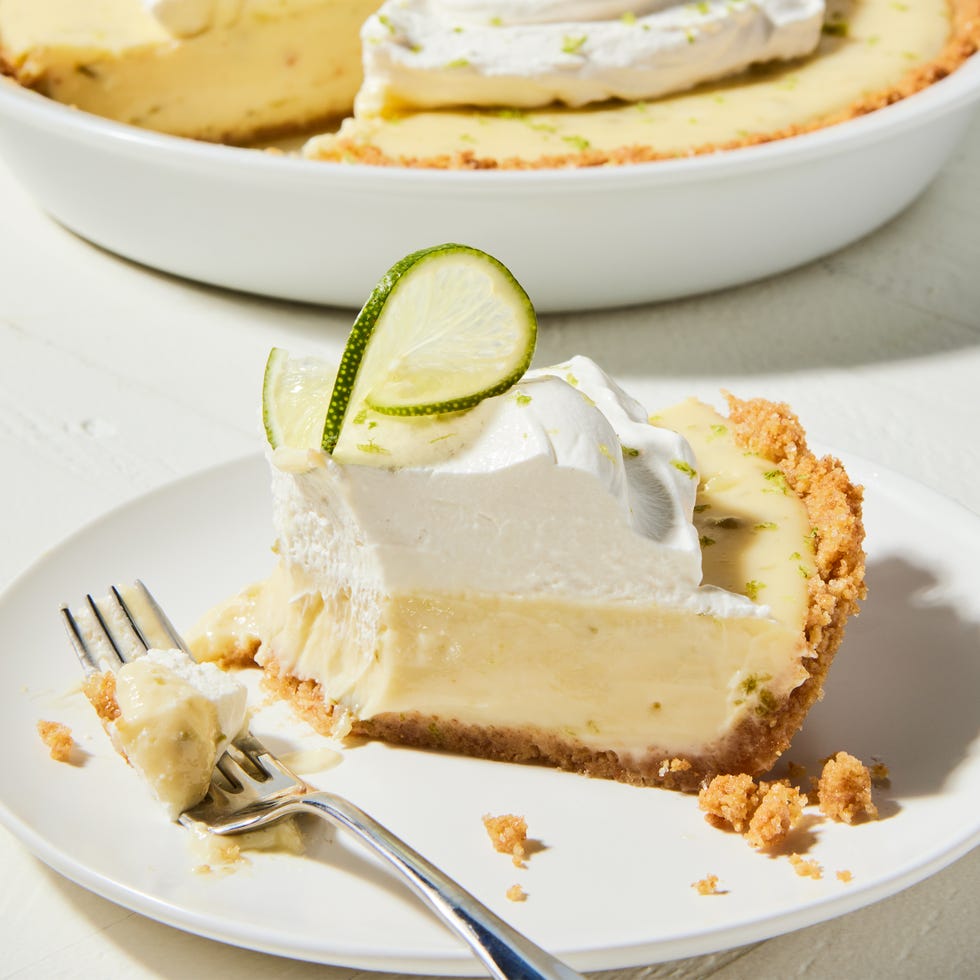 key lime pie with whipped cream and lime zest
