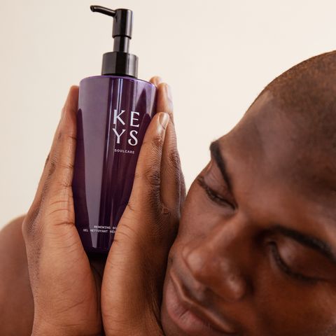 man holding keys soulcare body and hand wash