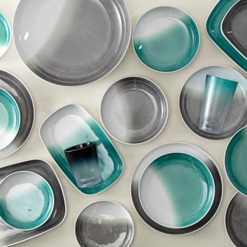 a group of different colored glass plates a group of different colored glass plates
