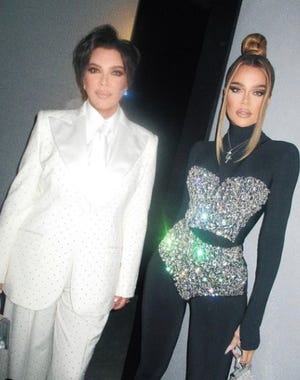 khloé kardashian and kris jenner twin in matching black suits