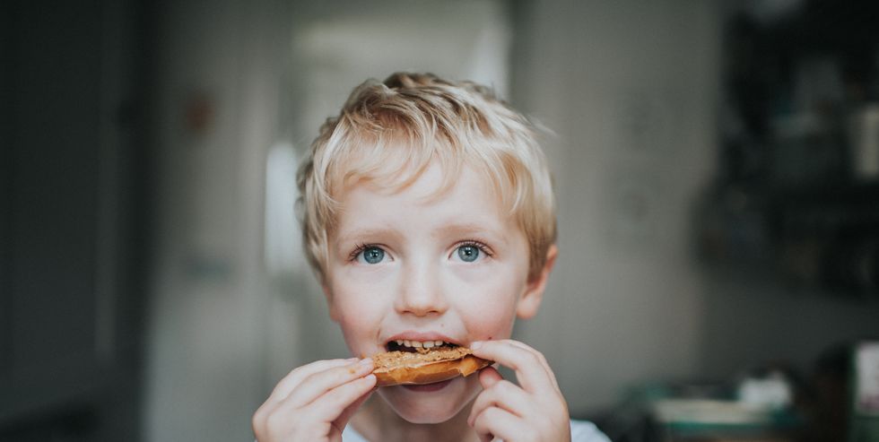 kid eating a bagel