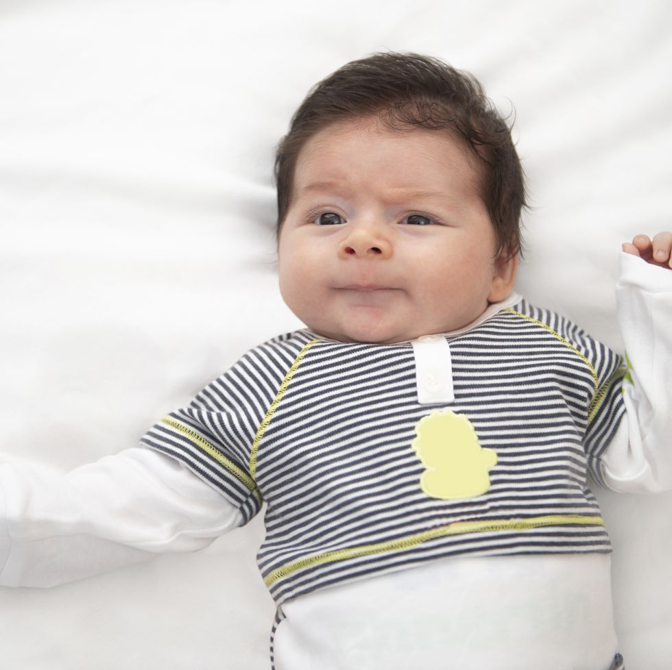 multicultural baby names, kid in bed.