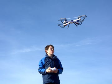 A child plays with a drone 