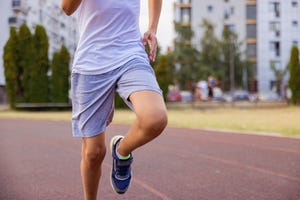 kid running on the track