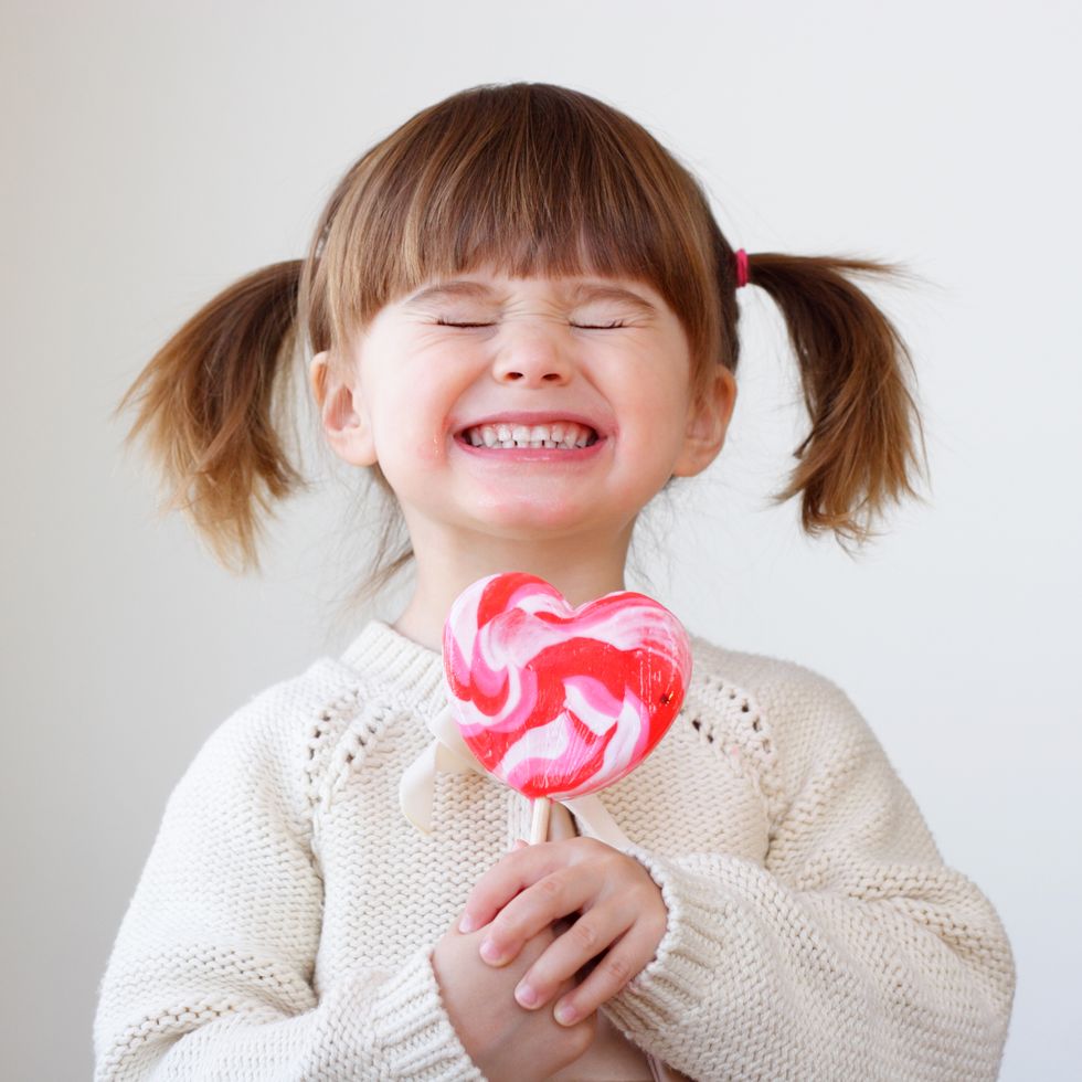 kid with heart lollipop valentines day jokes
