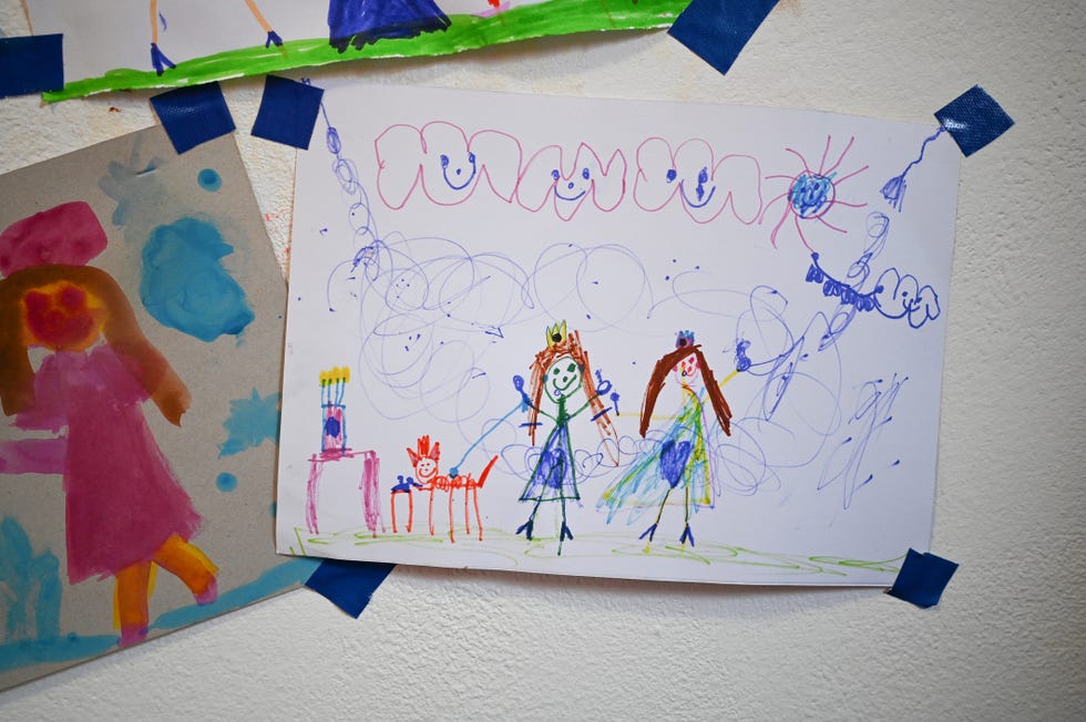 childs picture on a wall
