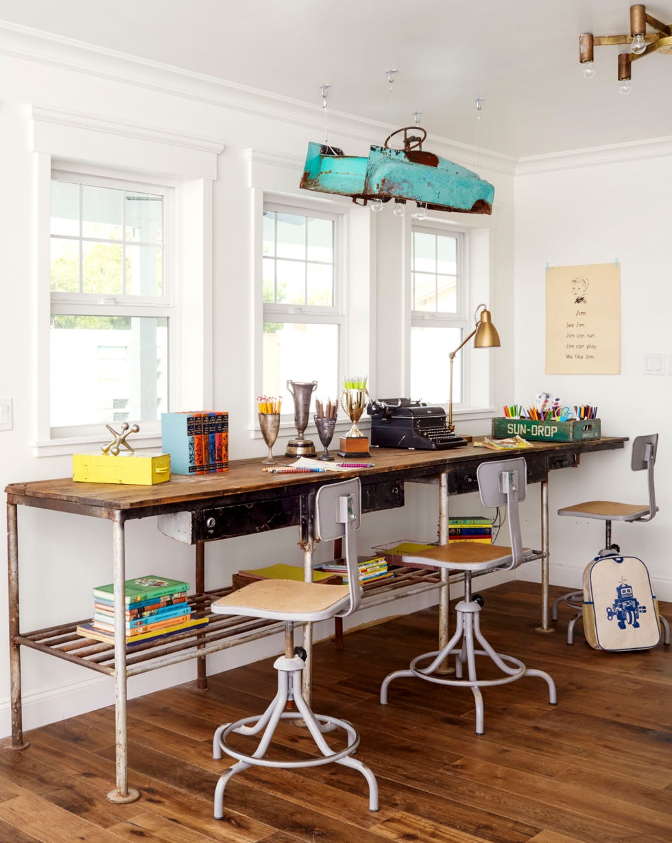 kids desk with car light fixture above