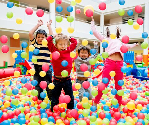 kids playing at a ball pool