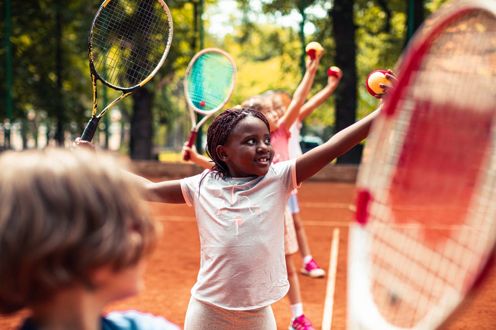 kids playing tennis