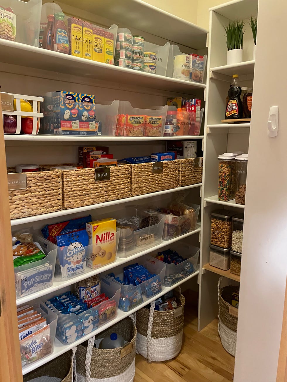 organized pantry with various food items and storage containers