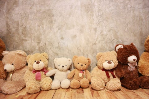 closeup of teddy bears against wall for toy organizing