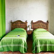 kids room with green twin beds