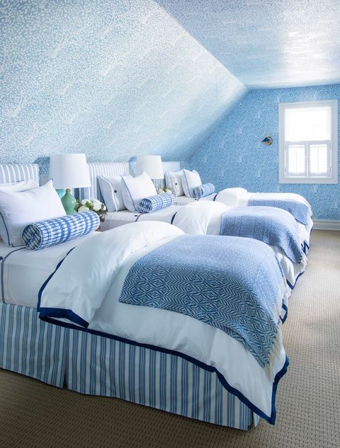 blue room with three twins beds