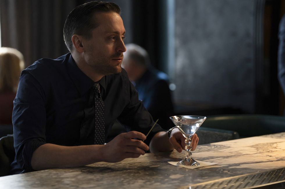 kieran culkin holding a martini in season 4 episode 10 of succession