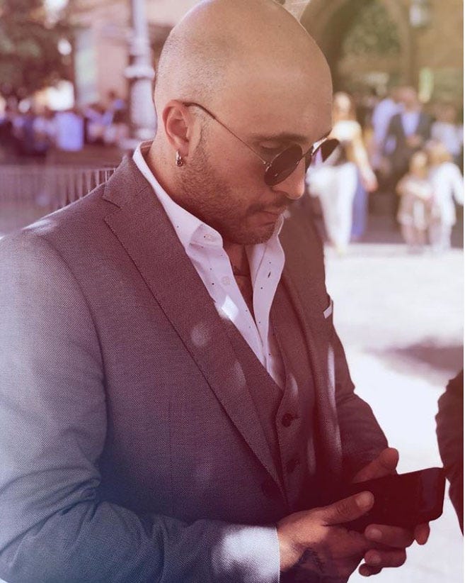 Photograph, Suit, Glasses, Eyewear, Formal wear, Tuxedo, Vision care, Photography, White-collar worker, Businessperson, 