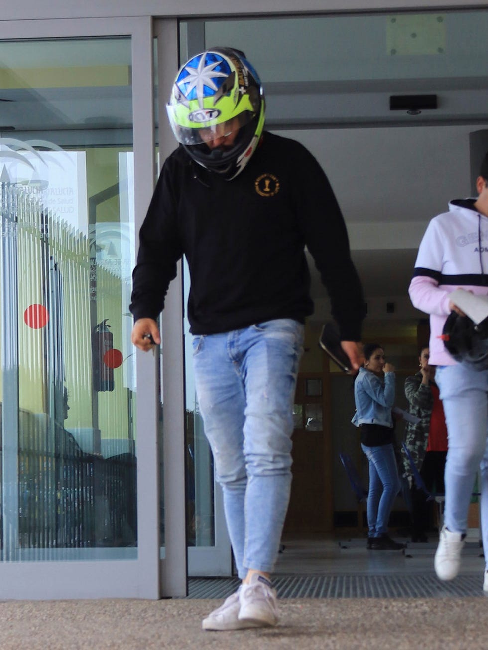 White, Jeans, Helmet, Personal protective equipment, Outerwear, Human, Footwear, Headgear, Leg, Sports gear, 