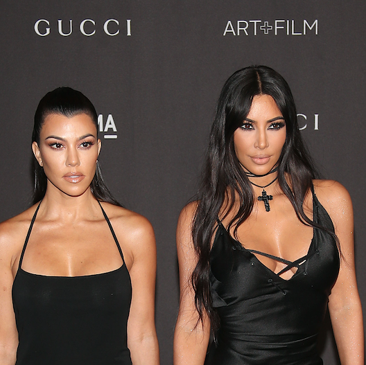 kim and kourtney twin with their kids in major 90s throwback