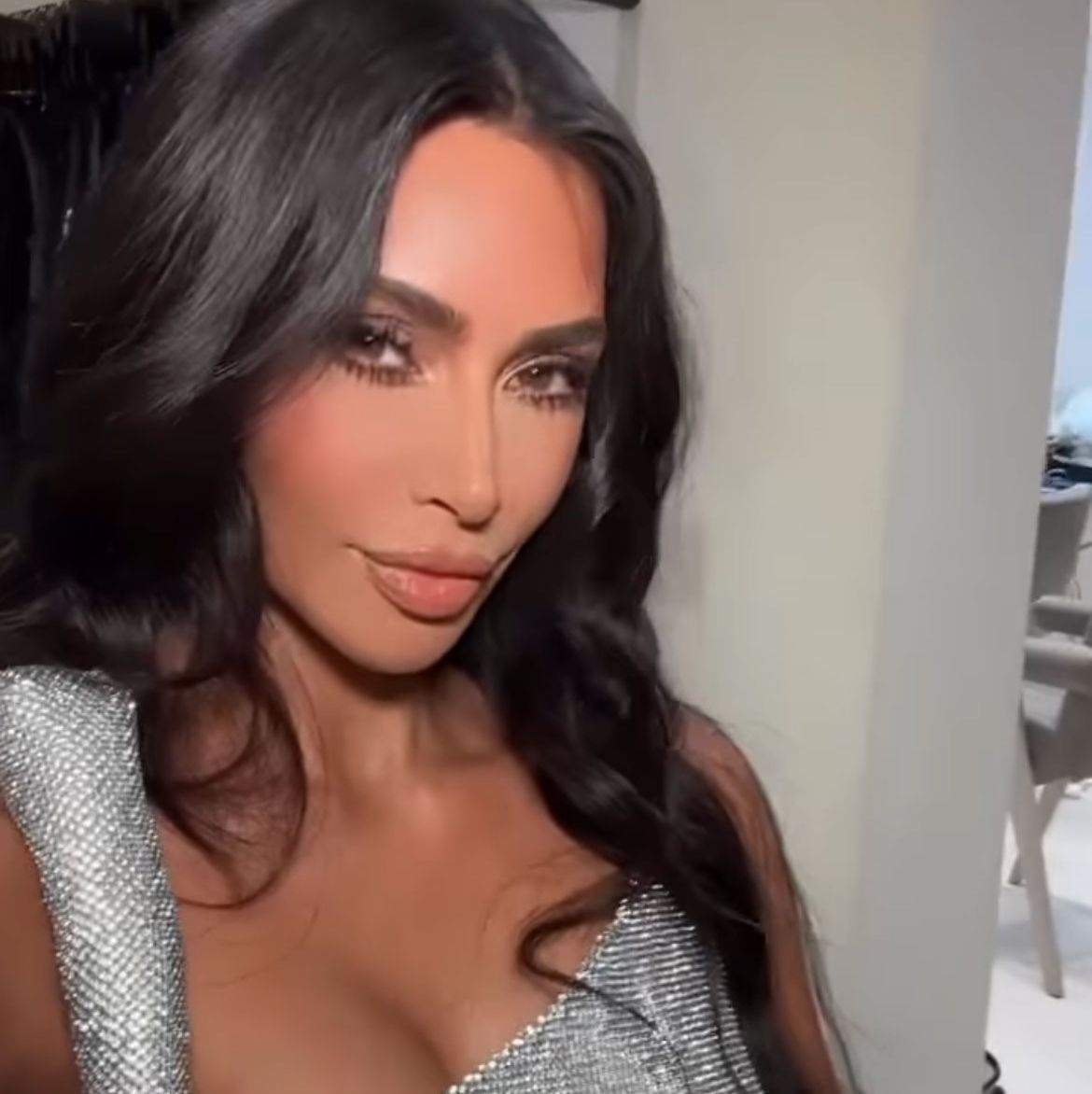 Kim Kardashian Stunned in a Glittering Column Dress With Newly Dark Hair at Her Family's Christmas Eve Party
