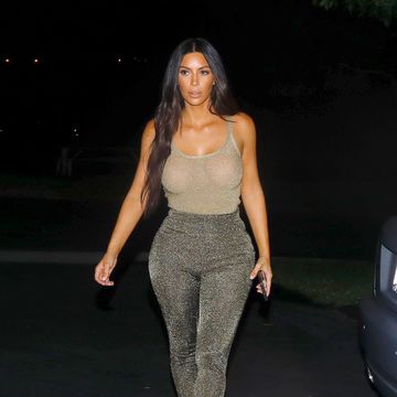Kim Kardashian wearing a sparkly outfit