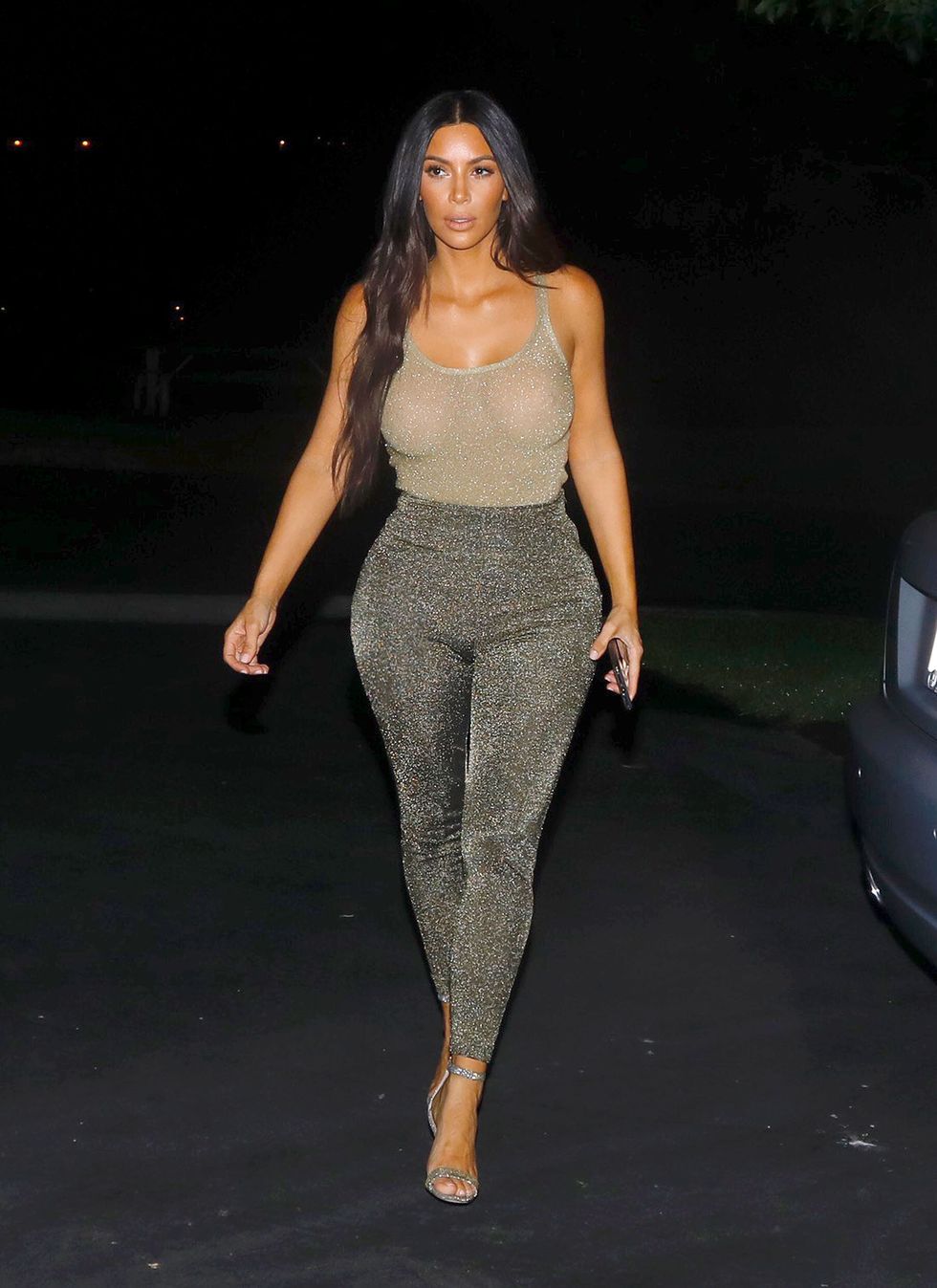Kim Kardashian wearing a sparkly outfit