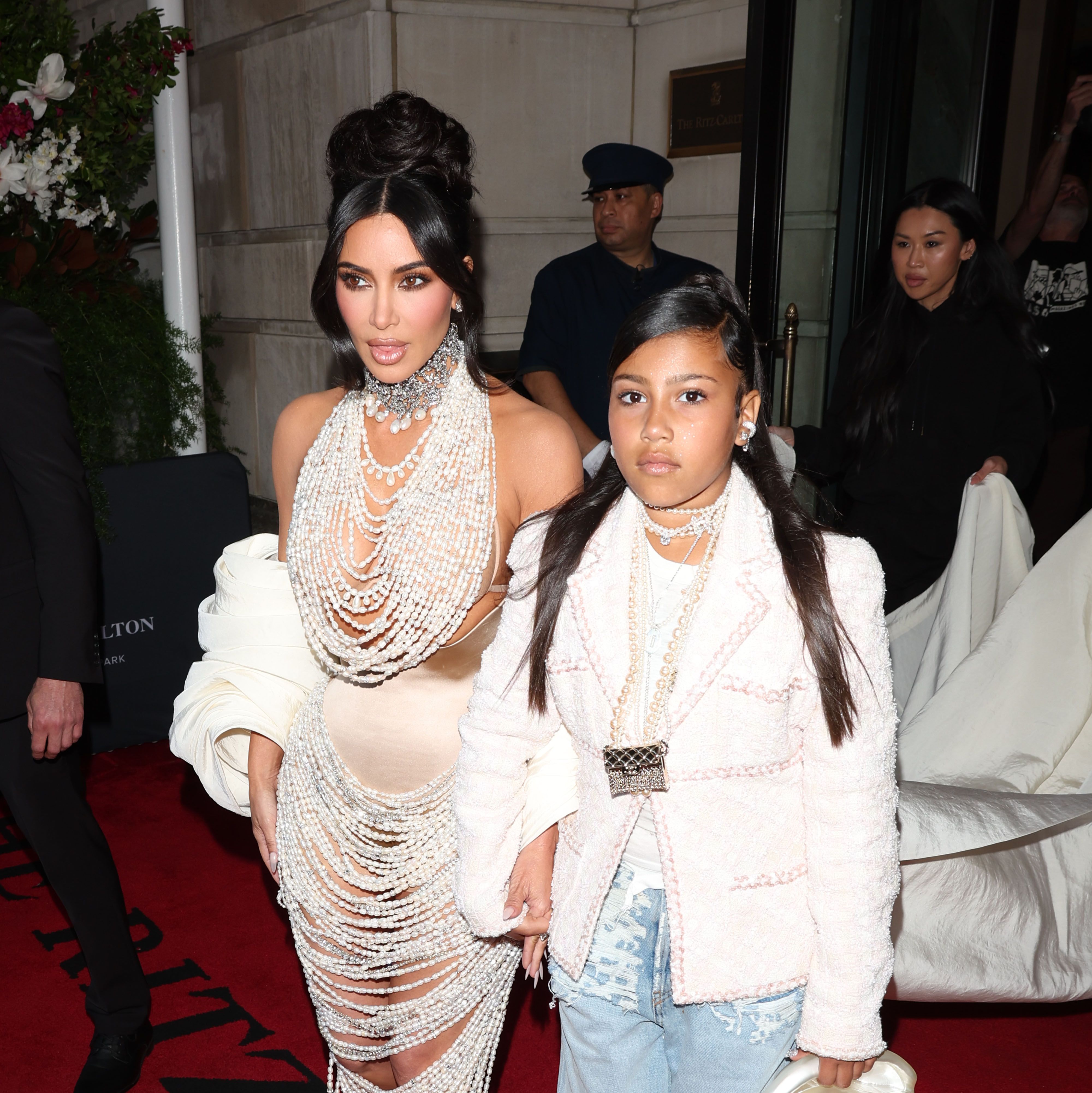 Kardashian and her daughter were photographed leaving their hotel together, but Kardashian went on to pose separately.