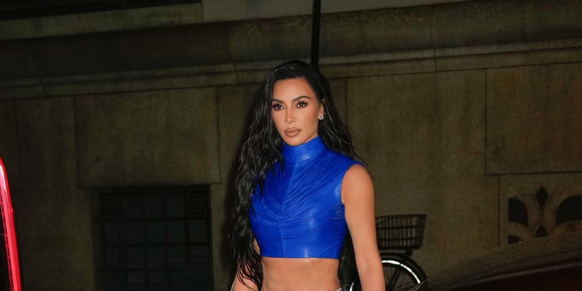 Kim Kardashian covers up in maxi skirt after revealing she is down