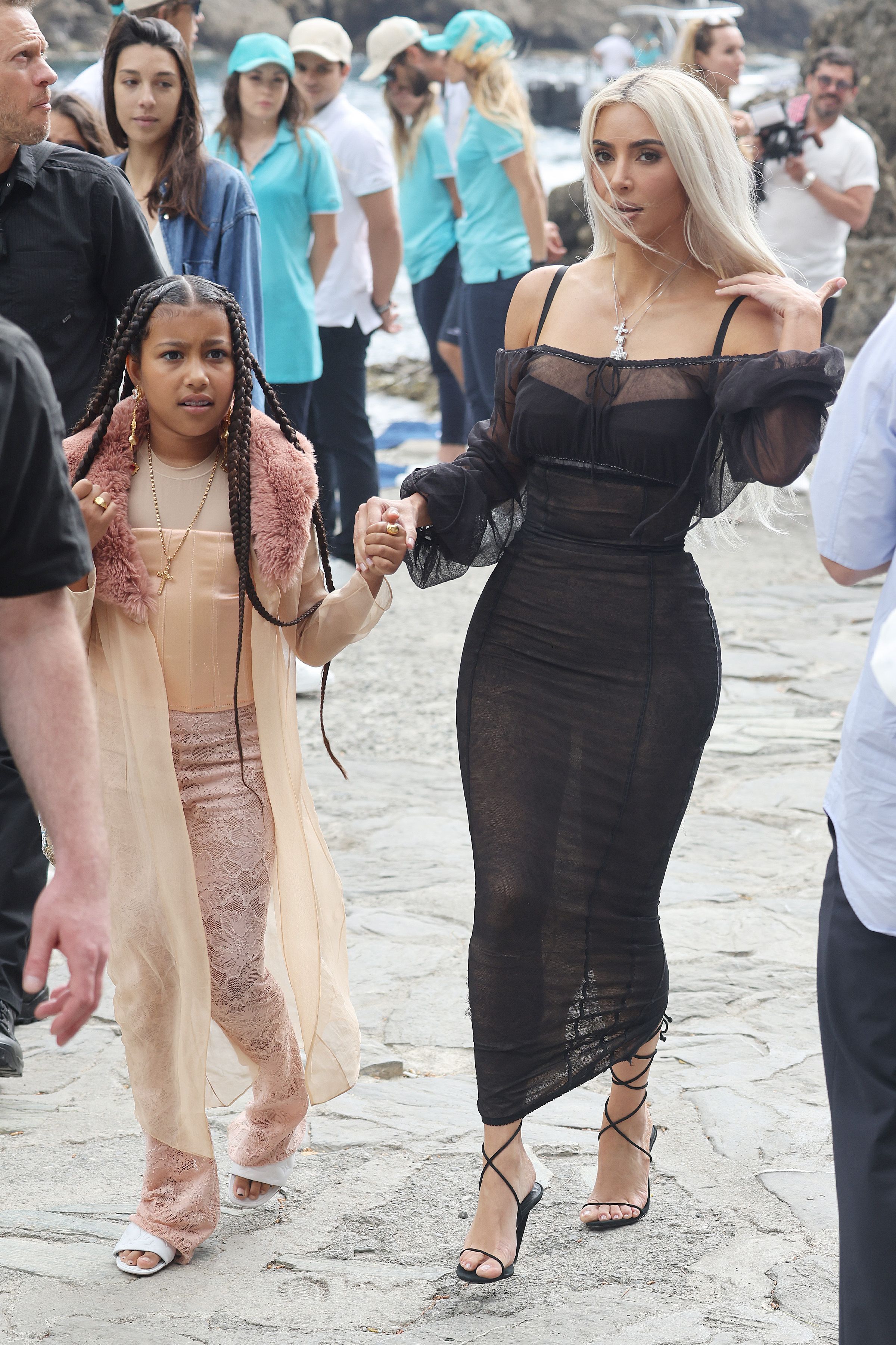 Kim Kardashian wows in black cut-out dress alongside half-sister Kylie  Jenner at Paris Fashion Week | The Sun