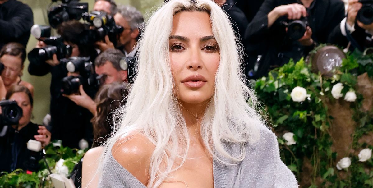 Kim Kardashian Explains Why She Wore a Cardigan With Her Sheer Corset Gown to the Met Gala
