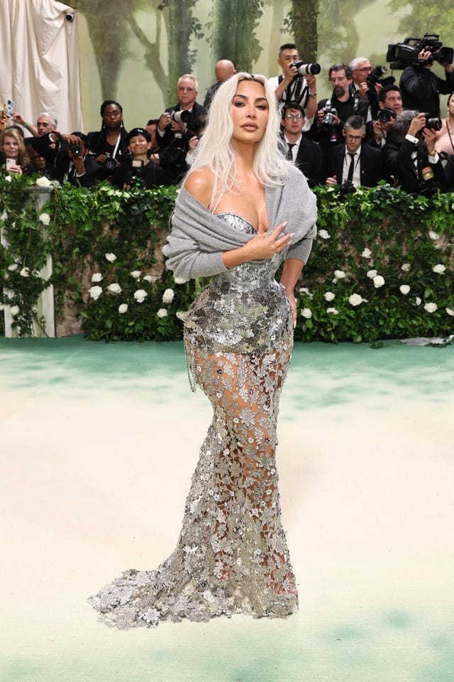 Kim Kardashian wore a corset and cardigan to the 2024 Met Gala