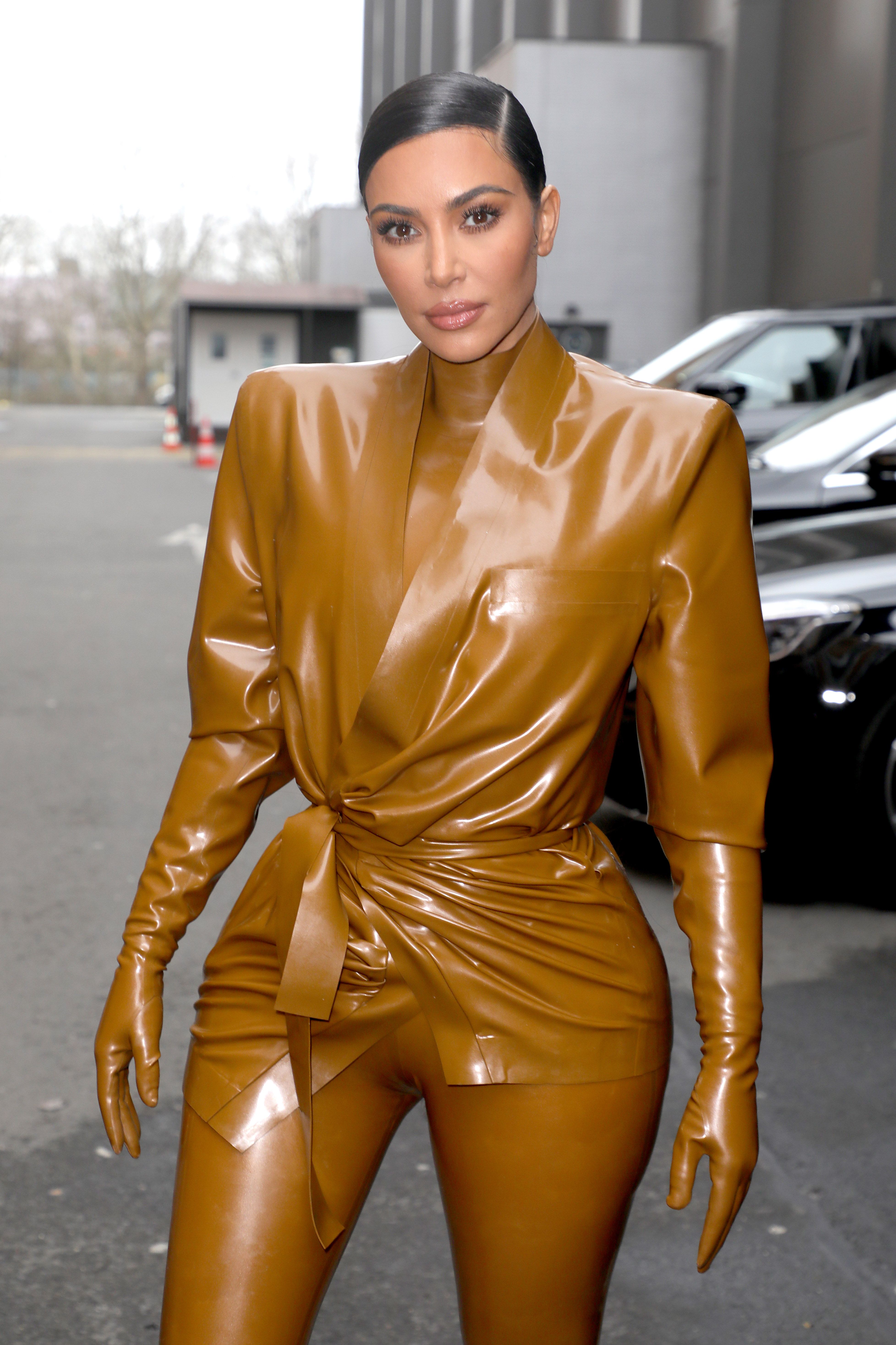 Kim Kardashian West and Kourtney Kardashian Wear Matching Latex Looks