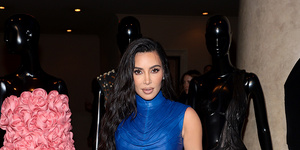 kim kardashian wears a blamain blue leather crop top and maxi skirt