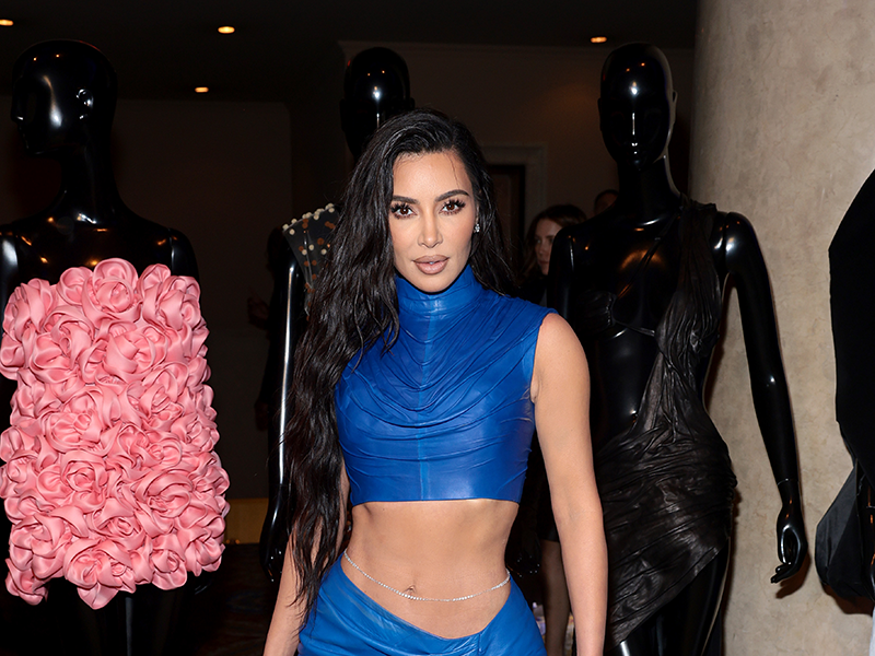 Kim Kardashian rocks a blue leather crop top & maxi skirt co-ord