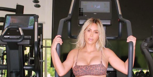 Kim Kardashian sports a corset at the gym