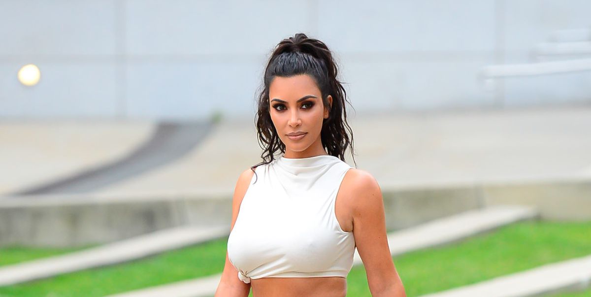 Kim Kardashian shows off her shredded back muscles during workout