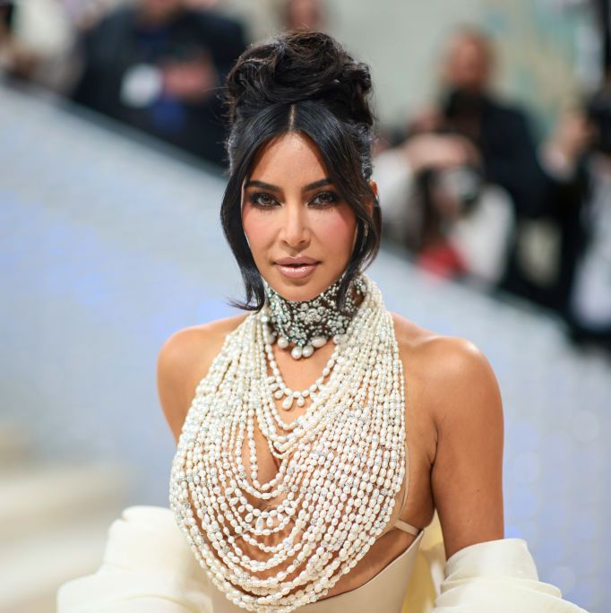 Kim Kardashian showcases her tiny waist in vintage Chanel pink and