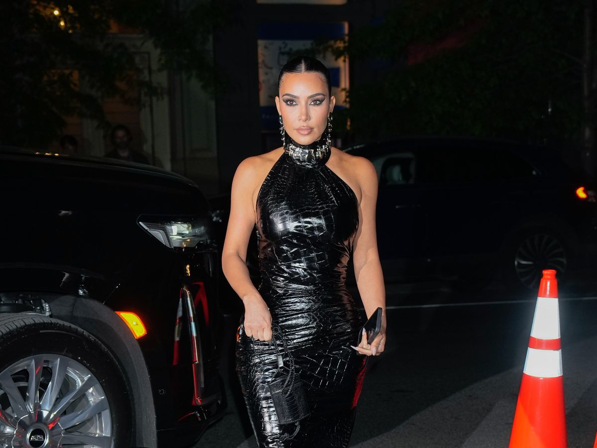 Kim Kardashian Wears a Fitted Cutout Dress to her Former