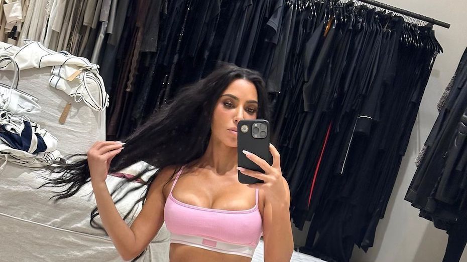 Kim Kardashian nearly spills out of tiny bra top as she shows off extremely  thin frame and shrinking waist in new pics