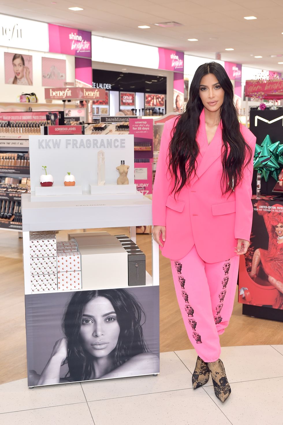 Kim Kardashian slips her curves into a FLAME print catsuit for