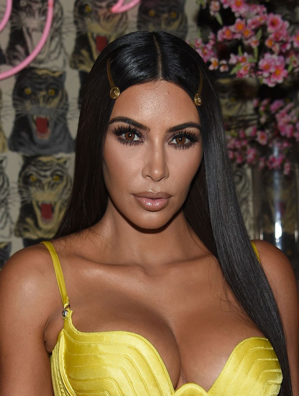 Kim Kardashian looks incredible in this bright yellow Versace