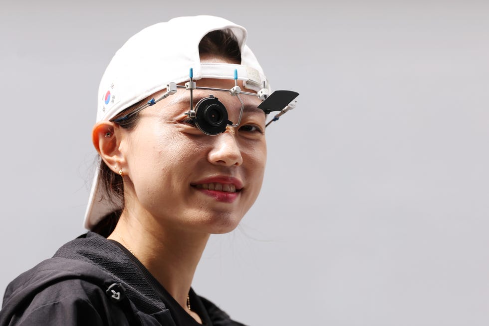 kim ye ji wearing a backwards cap and eyepieces during her olympic shooting competition