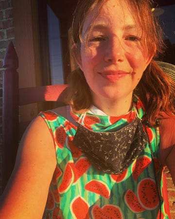 kim mccoy wearing a watermelon dress during the last annual heat of the south race