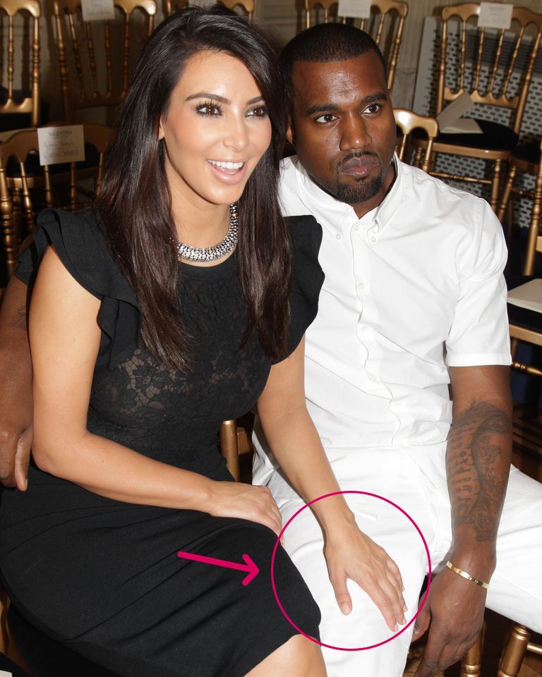 Kim's hand on Kanye's knee